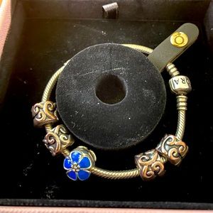 Authentic Pandora Bracelet. Charms authenticity unknown